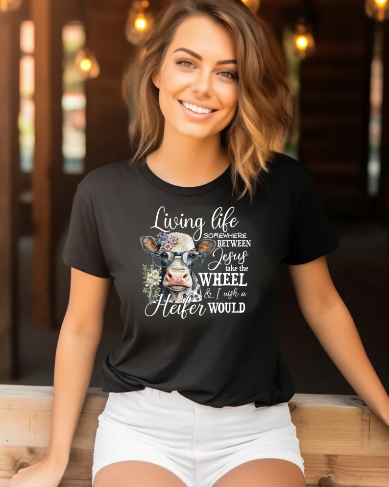 Living Life Somewhere Between Jesus Take the Wheel I Wish Heifer Would Shirt, Country Mama Shirt, Cow Lover Shirt, Farmer Life Shirt